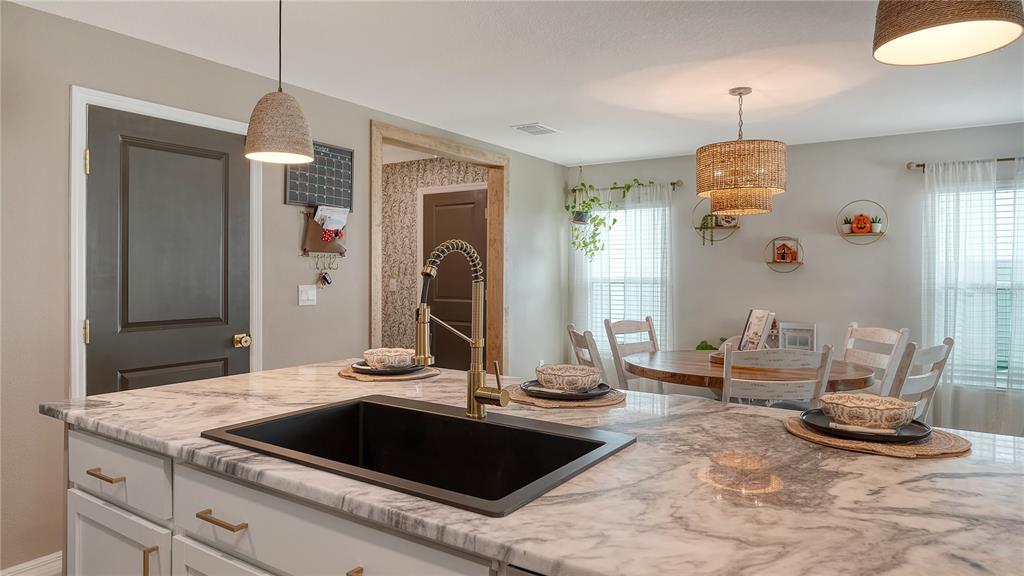 An aerial view of a two-story house featuring a backyard pool and fenced lawn — 10016 BIG MARSH TERRACE, PARRISH, FL