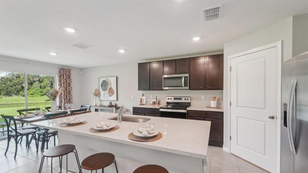 13429 CASTLE PEAK CIRCLE, DADE CITY, FL — photo 2 of 23