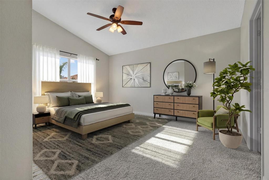 A bedroom features a vaulted ceiling, a ceiling fan, a bed, and a dresser — 19500 GLEN ELM WAY, ORLANDO, FL