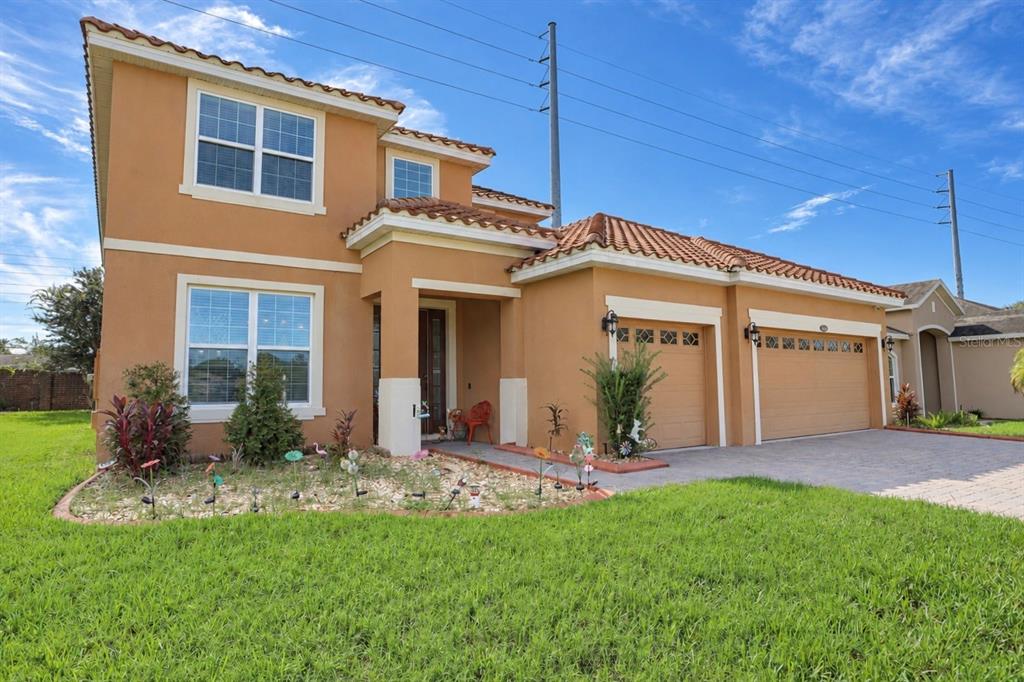 This is a floor plan for a single-story home featuring a garage and covered lanai — 4858 TERRA SOLE PLACE, ST CLOUD, FL