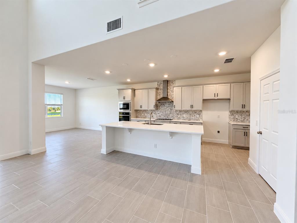 7028 ROLLING GARDENS LOOP, GROVELAND, FL — photo 2 of 13