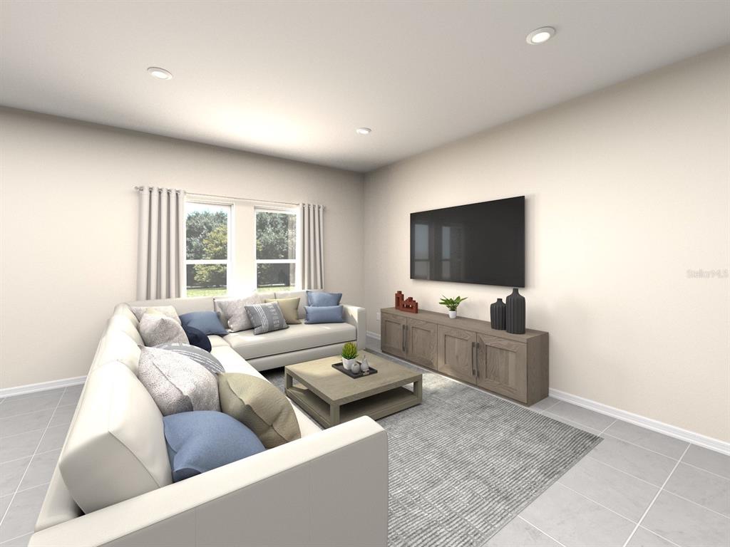This is a digital rendering of a living room featuring a sectional sofa and television — 1016 MONARCH PASS, LAKE HAMILTON, FL