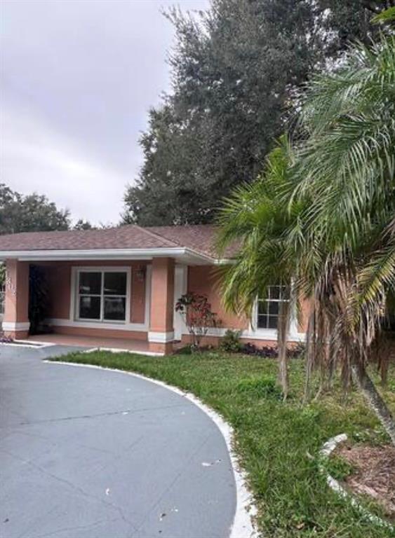 1302 ARIANA WOODS CIRCLE UNIT C