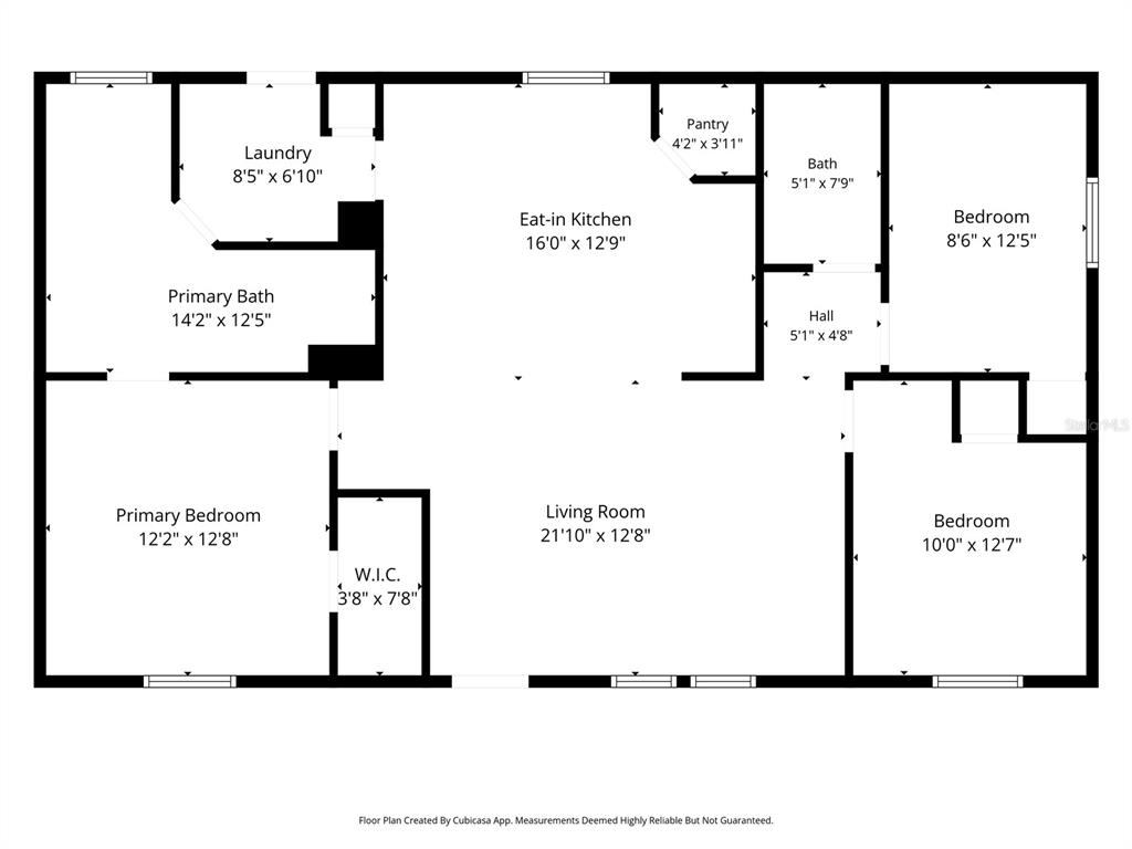 This is a floor plan showing a three-bedroom, two-bathroom home with an open living area — 24662 NW 84TH PLACE, ALACHUA, FL