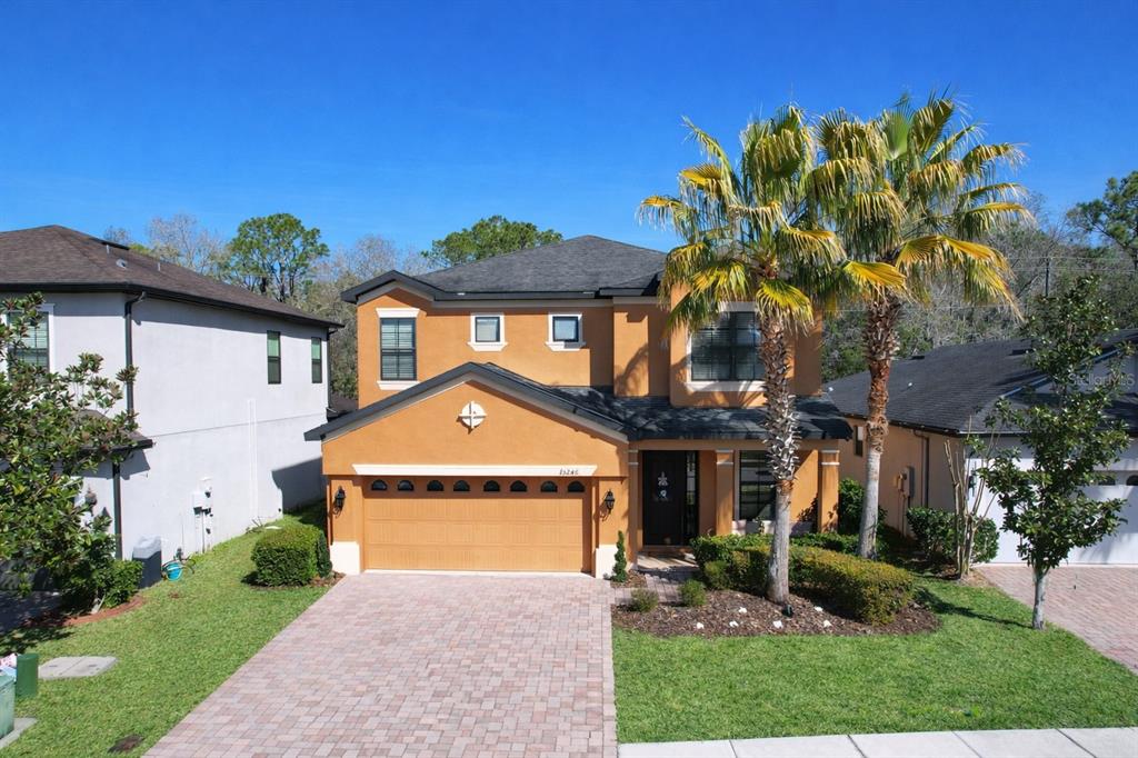 This is a two-story residential floor plan showing the layout of rooms and living areas — 15246 ANGUILLA ISLE AVENUE, TAMPA, FL