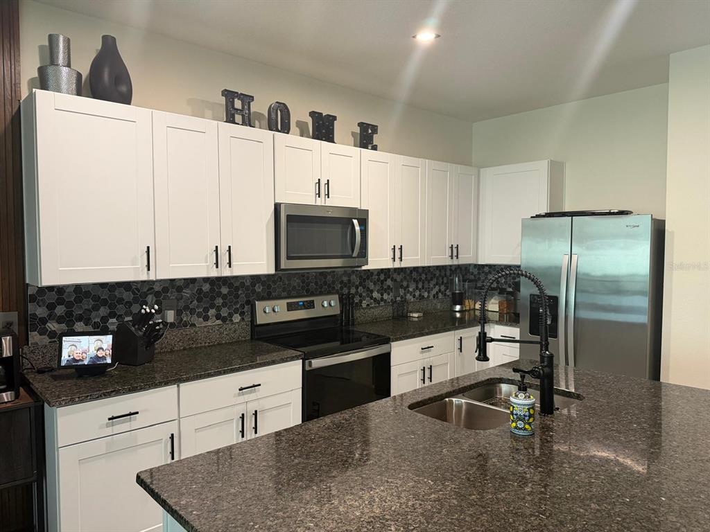 1346 ISLETA LOOP, KISSIMMEE, FL — photo 5 of 25