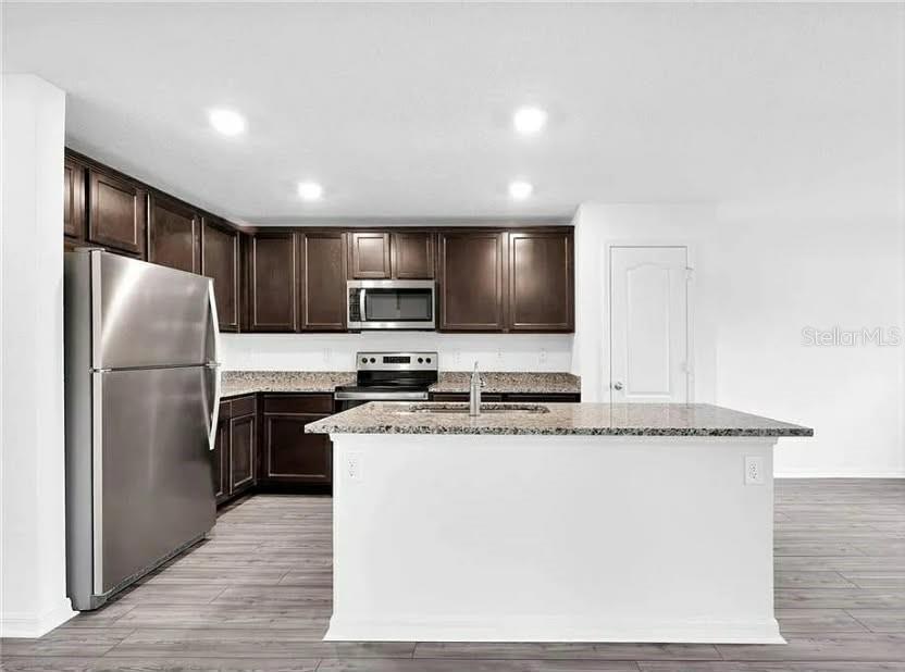 707 CARACARA COURT, POINCIANA, FL — photo 2 of 23