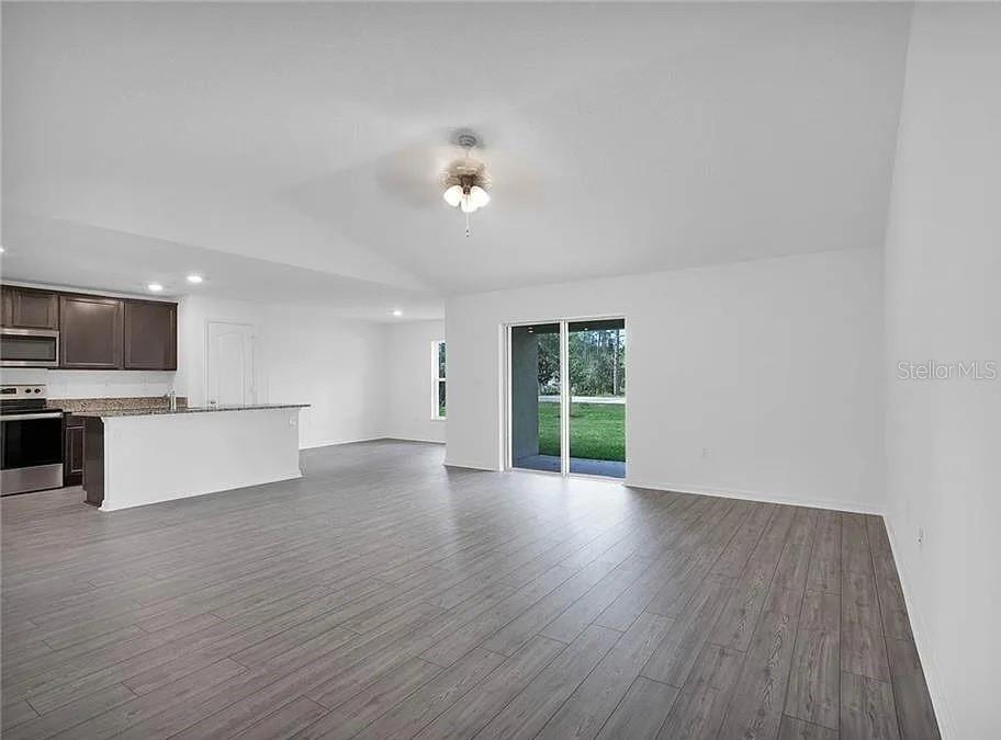 707 CARACARA COURT, POINCIANA, FL — photo 4 of 23