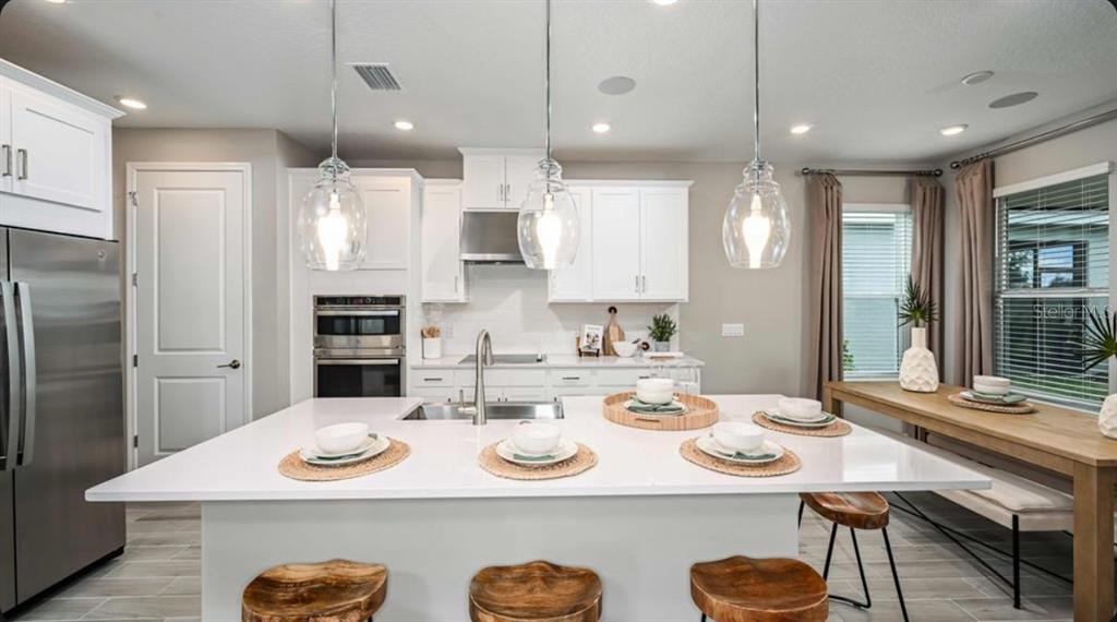 This image shows a grid of ten interior design material samples for home finishes — 5770 BINNACLE LANE, COCOA, FL