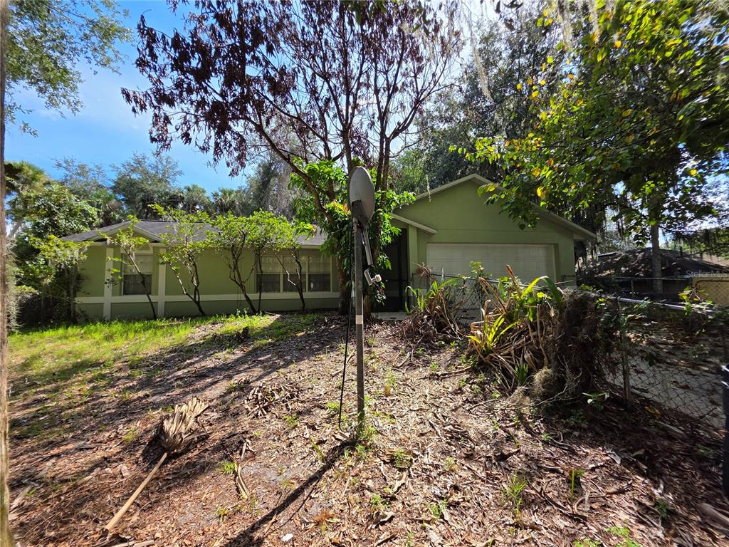 235 TOMS ROAD, DEBARY, FL — photo 2 of 26