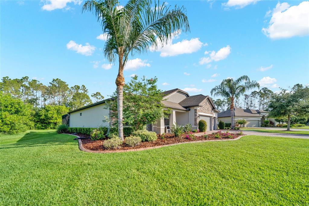 An aerial view shows a house with a pool and screened lanai on a lot — 2607 162ND PLACE E, PARRISH, FL