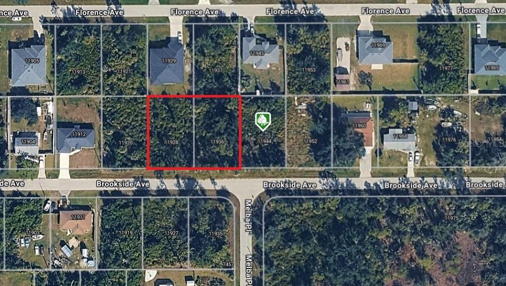 This aerial map shows two adjacent vacant lots highlighted in red between two residential streets — 11928 BROOKSIDE AVENUE, PORT CHARLOTTE, FL