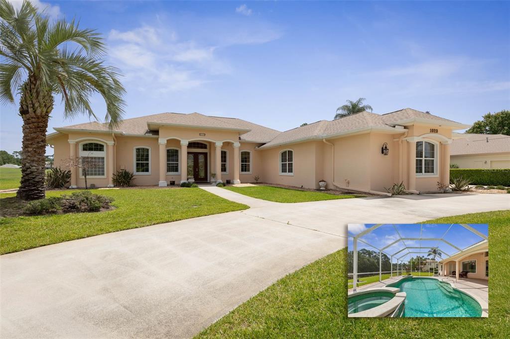 A single-story peach-colored house with a palm tree and an inset photo of a pool — 1023 HAMPSTEAD LANE, ORMOND BEACH, FL