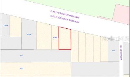 This is a property map showing a highlighted rectangular land parcel along a highway — E IRLO BRONSON MEMORIAL HIGHWAY, ST CLOUD, FL