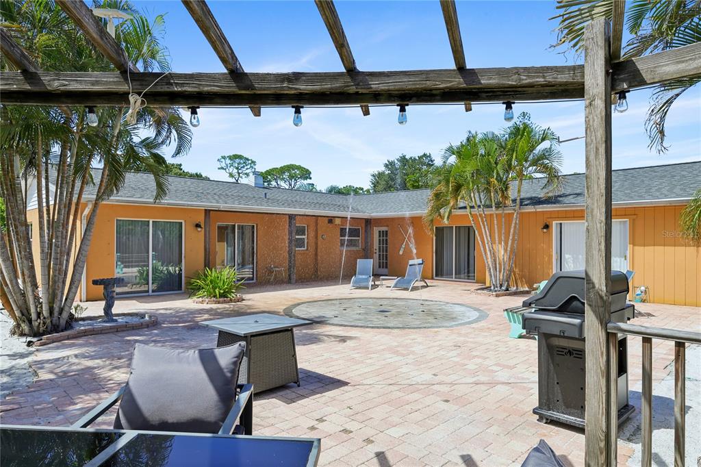 8479 PINEWOOD ROAD, SARASOTA, FL — photo 3 of 28