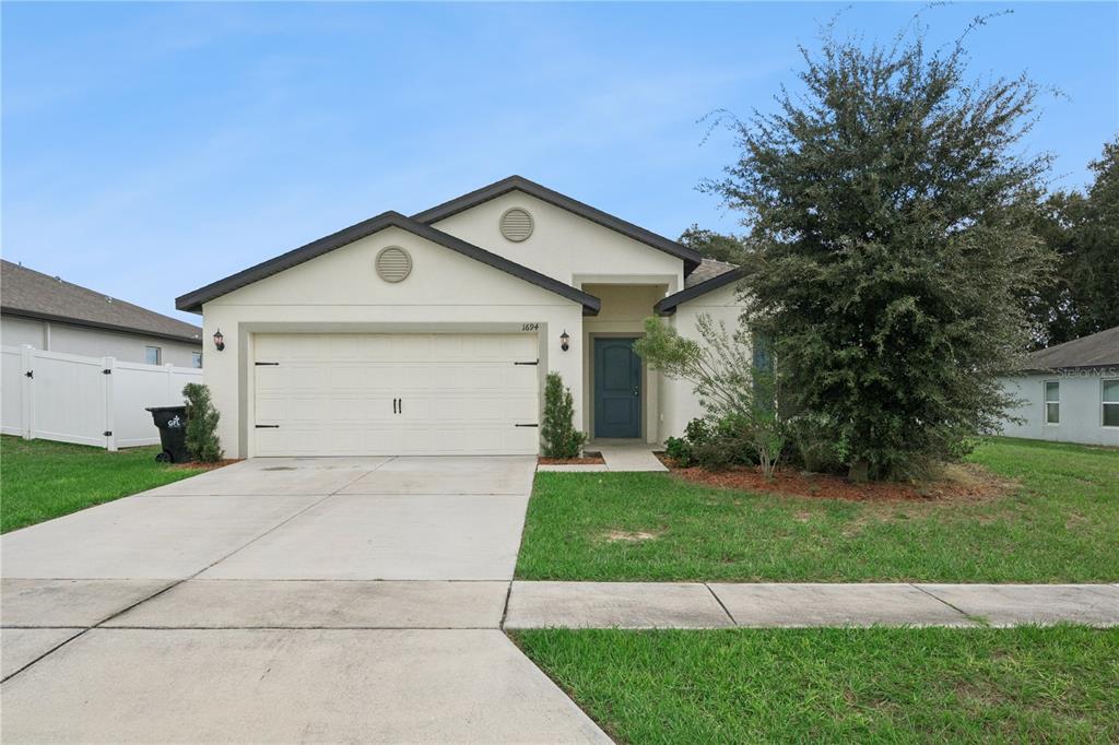1694 HIDEAWAY FLAT STREET, MASCOTTE, FL — photo 2 of 30