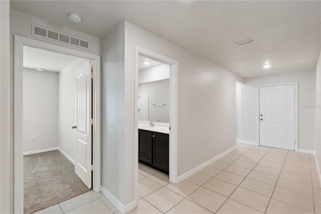 1694 HIDEAWAY FLAT STREET, MASCOTTE, FL — photo 3 of 30