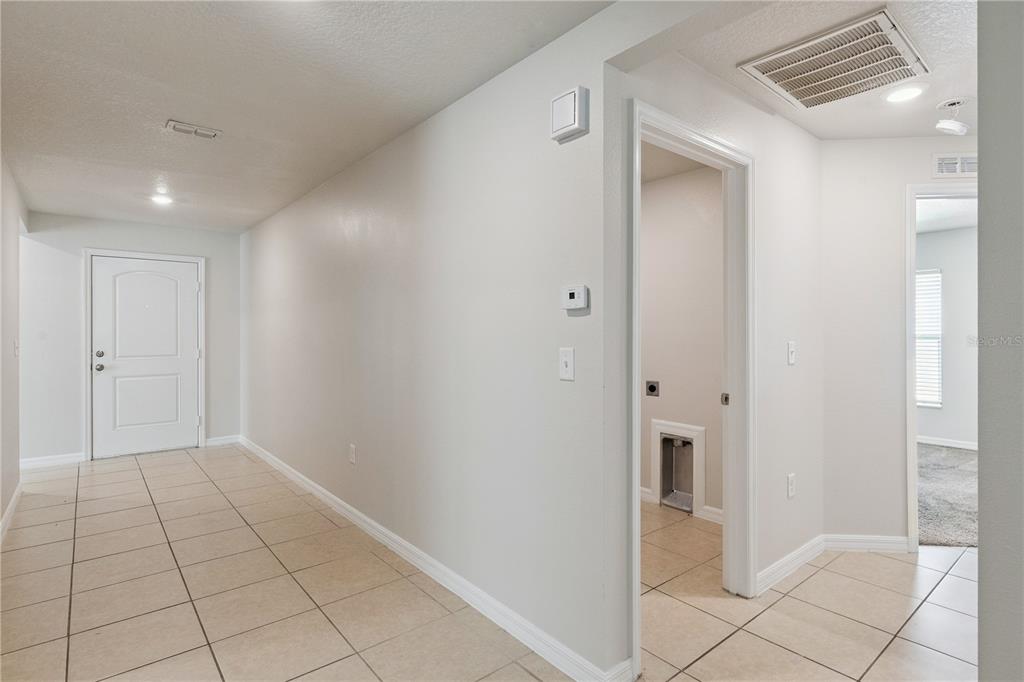 1694 HIDEAWAY FLAT STREET, MASCOTTE, FL — photo 4 of 30