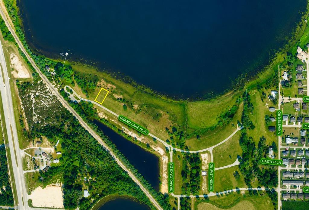 This is an aerial map showing a highlighted plot of land near Lake Damon — 998 GRAND LAKE BOULEVARD, AVON PARK, FL