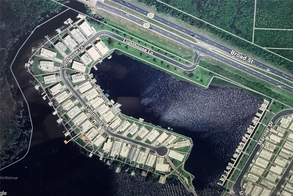 This is an aerial map view of a residential waterfront community along Lighthouse Lane — 1401 W HIGHWAY 50 UNIT 179, CLERMONT, FL