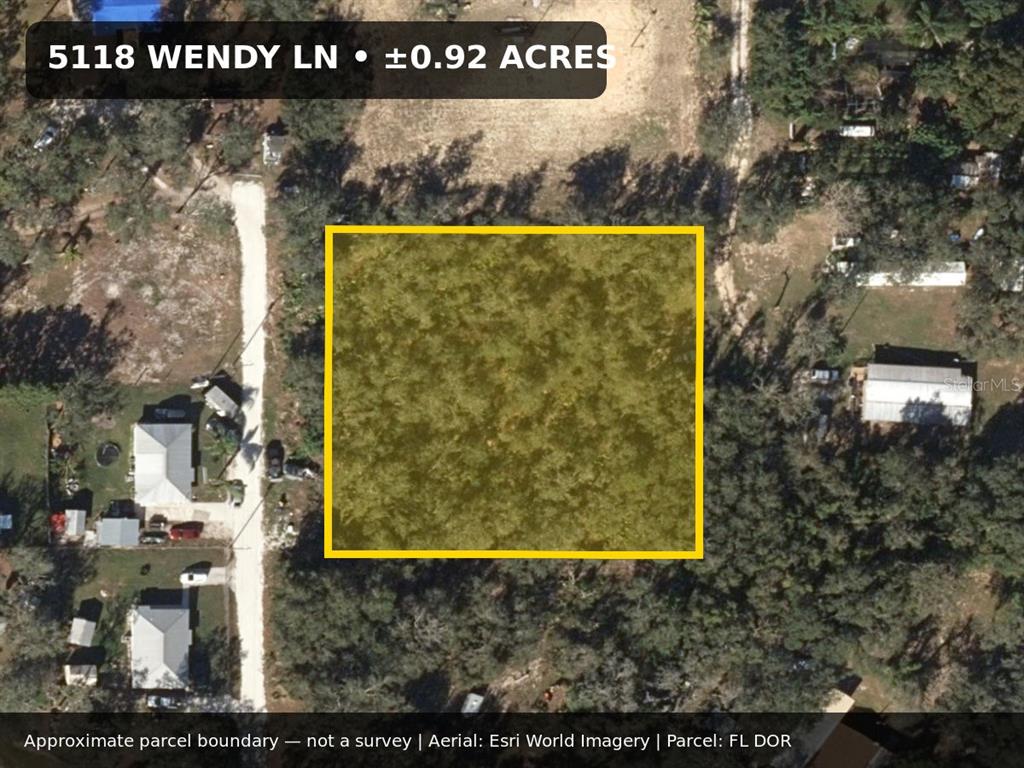 An aerial view shows a rectangular parcel of land outlined in yellow — 5118 WENDY LANE, SEBRING, FL