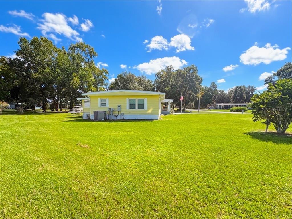 21 N BOBWHITE ROAD, WILDWOOD, FL — photo 2 of 30