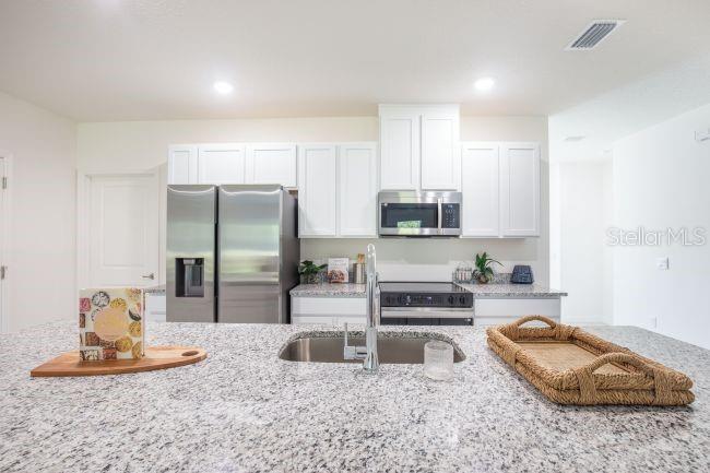 15163 SCAUP DUCK AVENUE, WEEKI WACHEE, FL — photo 4 of 23