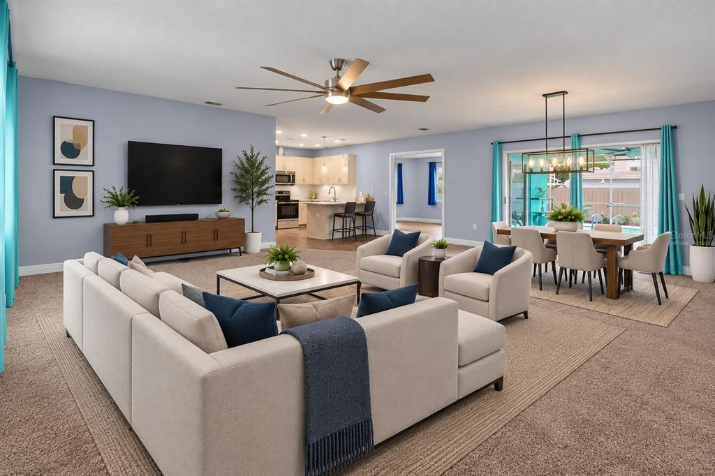A single-story house with a white exterior, brick accents, a garage, and three palm trees — 4607 SAWGRASS BOULEVARD, NEW PORT RICHEY, FL