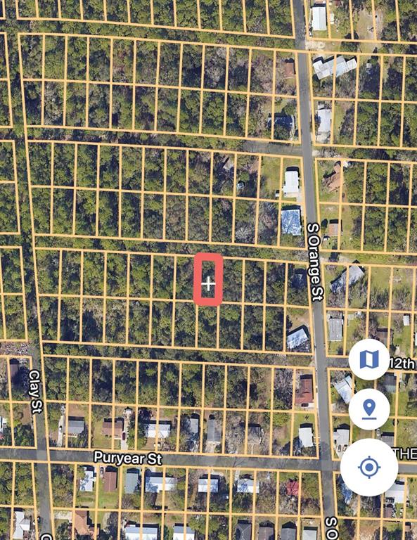 This is a satellite map view showing a vacant rectangular lot highlighted in red — 901 W 11TH STREET, ST AUGUSTINE, FL