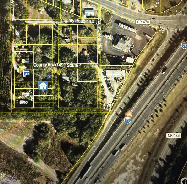 This is an aerial map showing property boundaries and surrounding roads near an interstate highway — LOT #4, LAKE PANASOFFKEE, FL