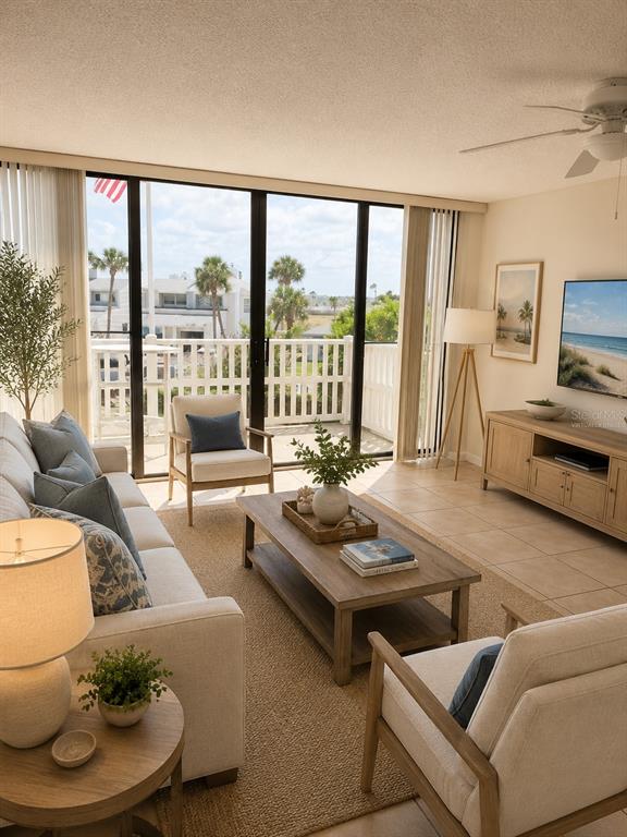 A room with tiled floors and large sliding glass doors leading to a balcony — 3580 S OCEAN SHORE BOULEVARD UNIT 101, FLAGLER BEACH, FL