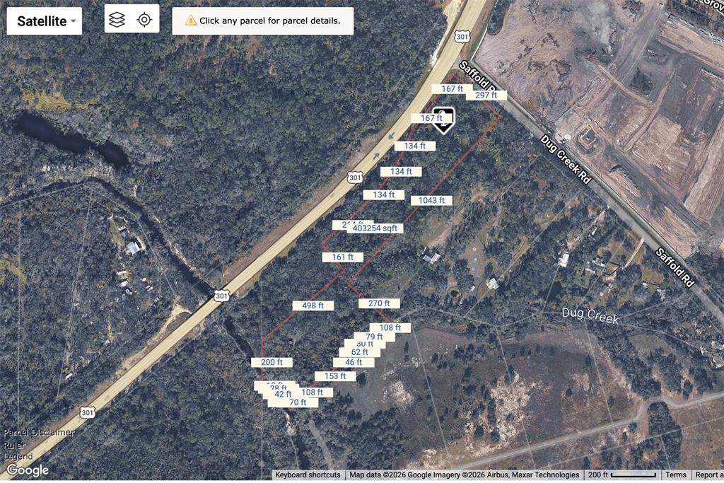 An aerial map shows a parcel of land outlined in red along a highway — 2819 SAFFOLD ROAD, WIMAUMA, FL