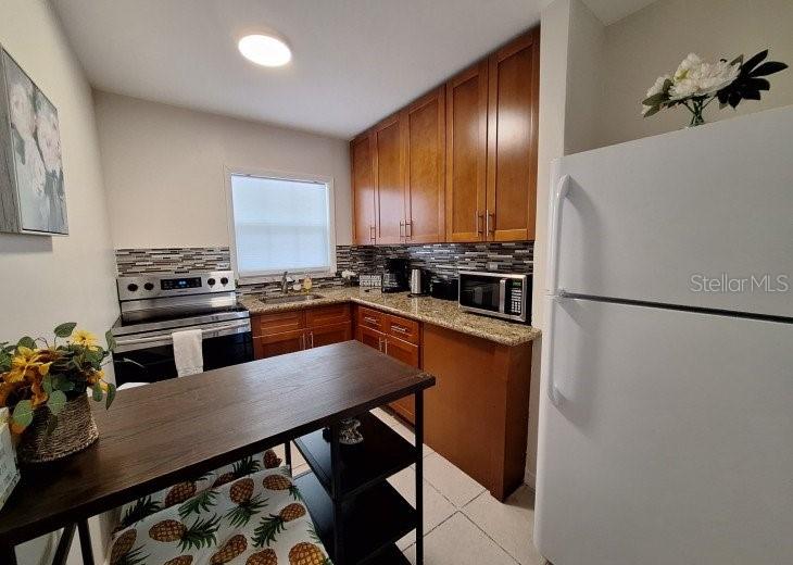 113 174TH AVENUE E UNIT B, REDINGTON SHORES, FL — photo 3 of 25