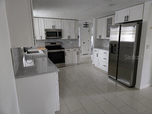6104 POLK STREET, NEW PORT RICHEY, FL — photo 3 of 13