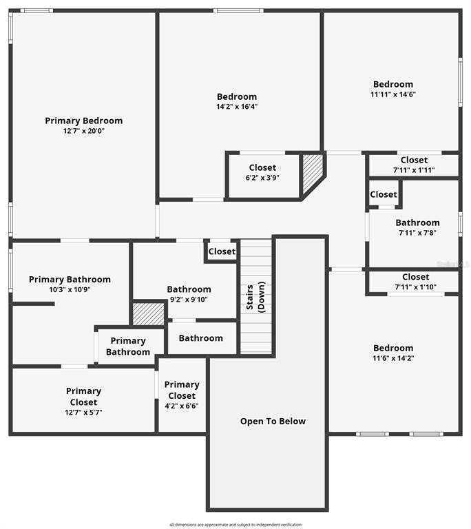 An entryway features light blue walls, tiled flooring, a white staircase, and a double door — 118 MIRO DRIVE, DAVENPORT, FL