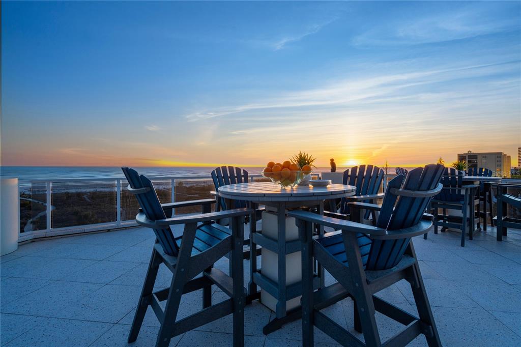 An elevated view of a sandy beach with winding paths through coastal vegetation — 534 BEACH ROAD, SARASOTA, FL