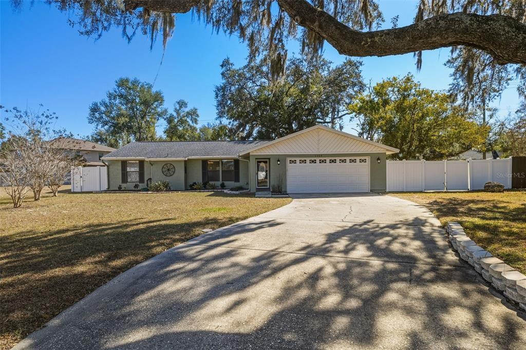 1309 RUSTLING OAKS DRIVE
