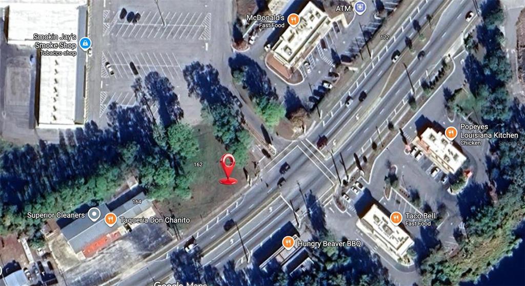 This is a satellite map view of a commercial area featuring several restaurants and businesses — 162 S US HIGHWAY 17, EAST PALATKA, FL