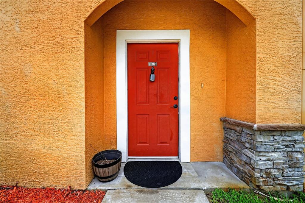 This is a two-story floor plan showing the layout of a residential unit — 2217 TUSCANY TRACE UNIT 7, PALM HARBOR, FL