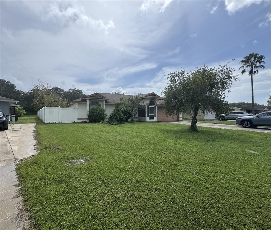 545 BAR DR, POINCIANA, FL — photo 2 of 30