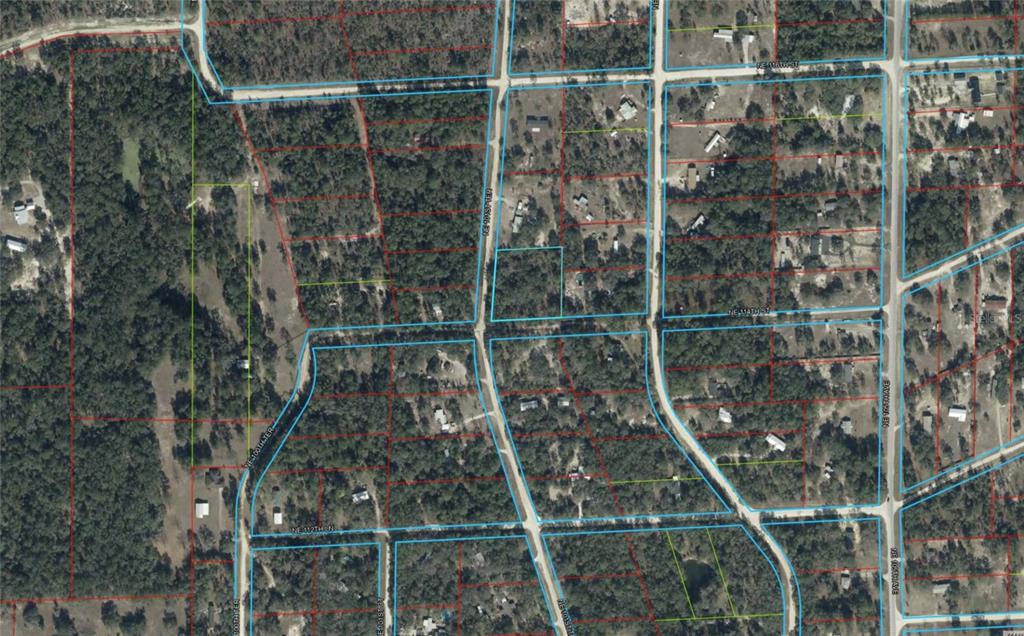 This is an aerial map showing residential land parcels and roads in a wooded area — TBD NE 101ST TERRACE, ARCHER, FL