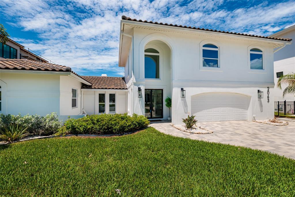 This is a two-story floor plan featuring a swimming pool, multiple bedrooms, and a garage — 2063 ILLINOIS AVENUE NE, ST PETERSBURG, FL