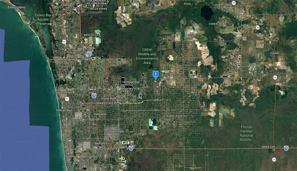 This is a satellite map showing the area surrounding the CREW Wildlife and Environmental Area — 2900 WILSON BLVD N, NAPLES, FL