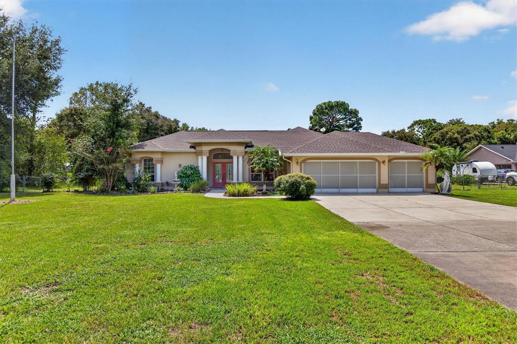 9412 GROUSE WAY, HUDSON, FL — photo 2 of 30
