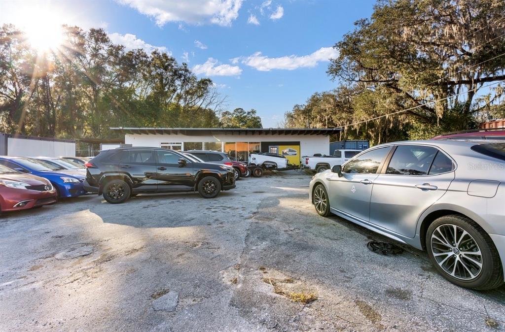 This is an aerial map view showing a property lot with buildings and trees — 2310 SE 59TH STREET, OCALA, FL