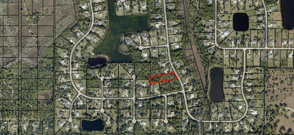 This is an aerial map showing a highlighted vacant residential lot in a suburban neighborhood — 5690 CYPRESS CREEK DRIVE, GRANT VALKARIA, FL