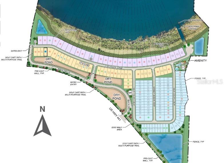 An aerial view shows a vacant residential development lot situated next to a large lake — 19309 LOCHSIDE LANE, MOUNT DORA, FL