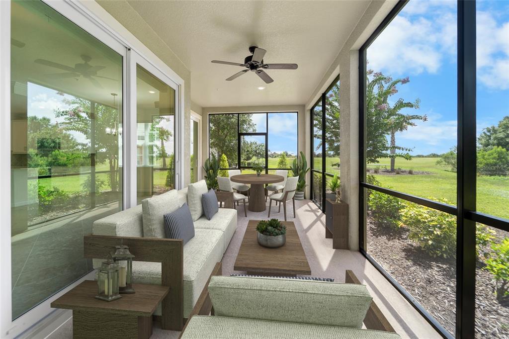 A screened-in patio with outdoor furniture, a ceiling fan, and views of a grassy field — 7342 DIVOT LOOP, LAKEWOOD RANCH, FL
