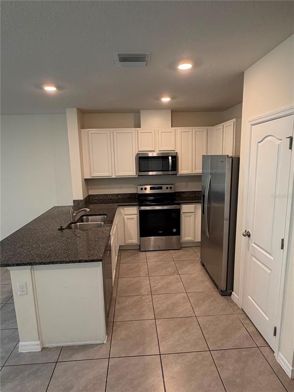 1512 LUMBER AVENUE, DAVENPORT, FL — photo 2 of 14