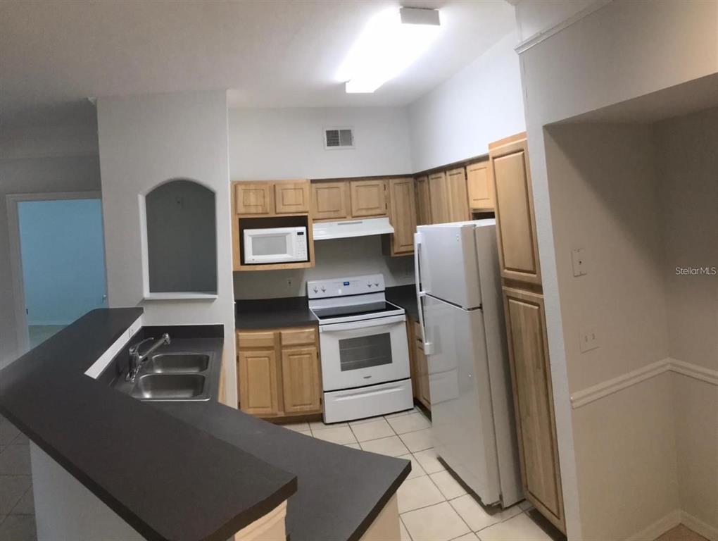 6627 QUEENS BOROUGH AVENUE UNIT 108, ORLANDO, FL — photo 5 of 30